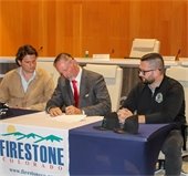 Mayor Conyac signing the pre-development agreement