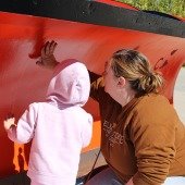 Family painting plow