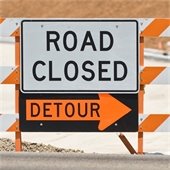 road closure sign on a street